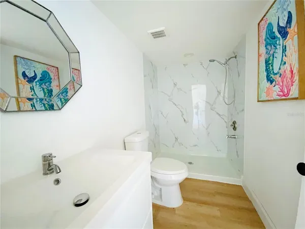 a bathroom with a sink and a tub