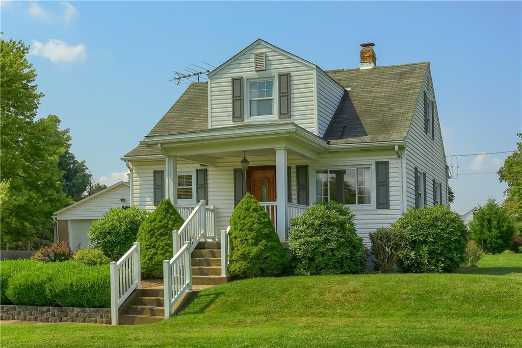 420 Big Knob Road Rochester, PA 15074 - Photo 3 of 24 a front view of a house with a yard