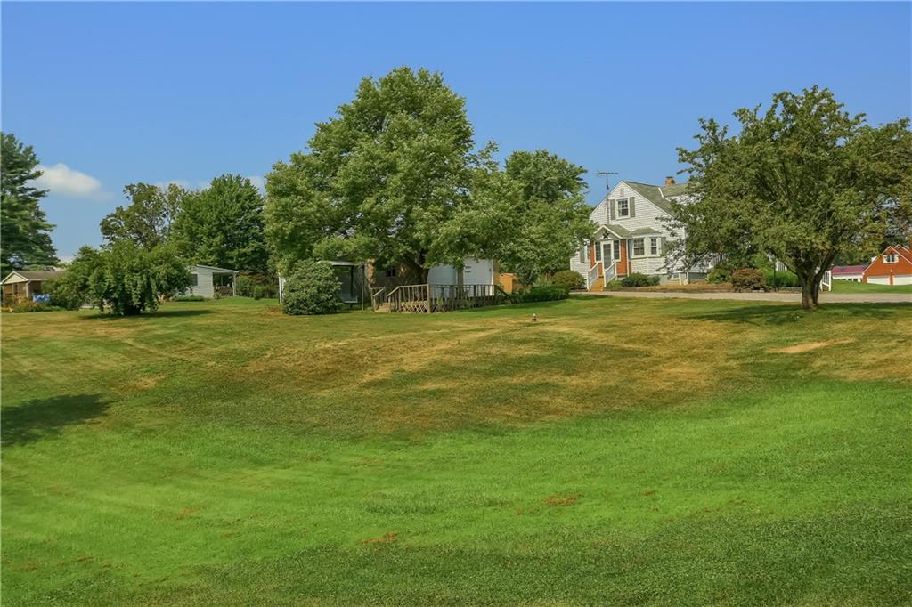 420 Big Knob Road Rochester, PA 15074 - Photo 22 of 24 a view of a big yard with a house in the background