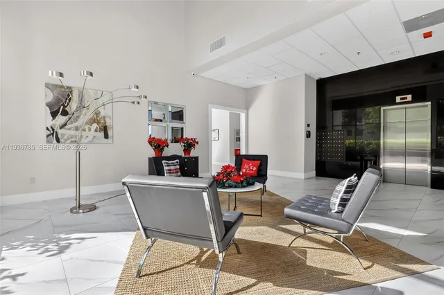 a view of an empty room with a balcony