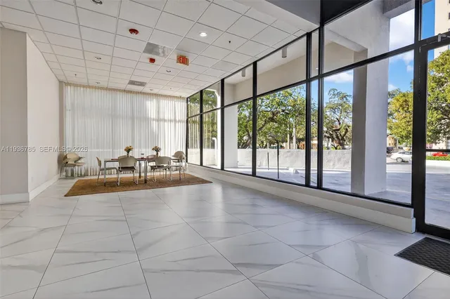 a view of swimming pool with outdoor seating