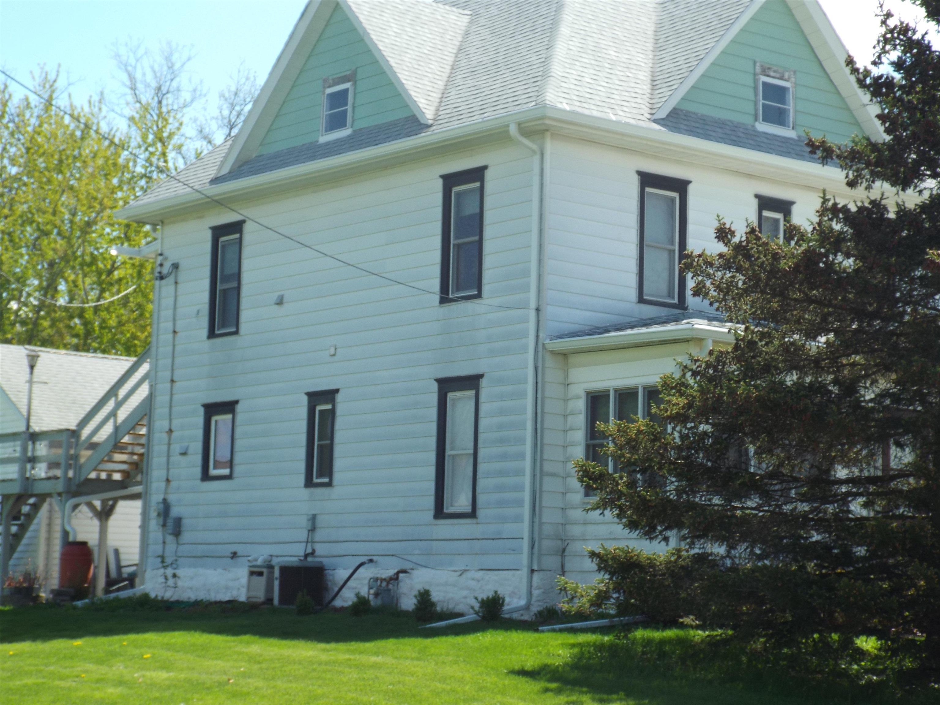 416 Chestnut Street Warren, IL 61087 - Photo 19 of 23 a front view of house with yard