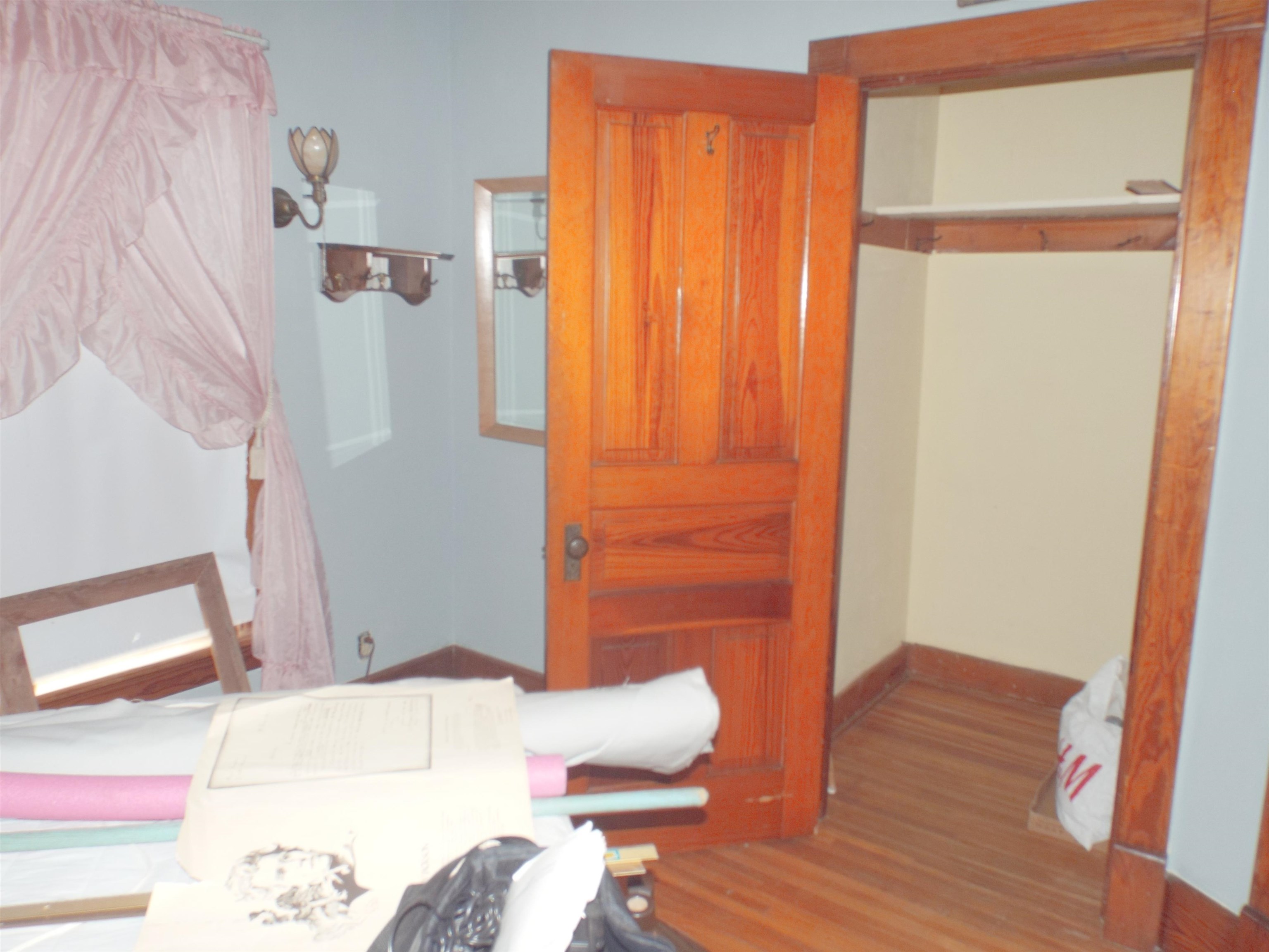 416 Chestnut Street Warren, IL 61087 - Photo 8 of 23 a bedroom with a bed and a window