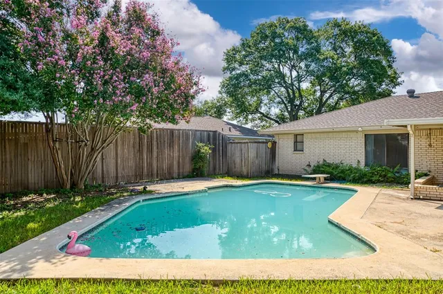 a view of a backyard with a small cabin