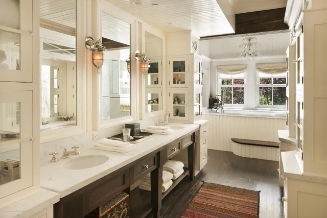 a outdoor dining space with furniture and a garden