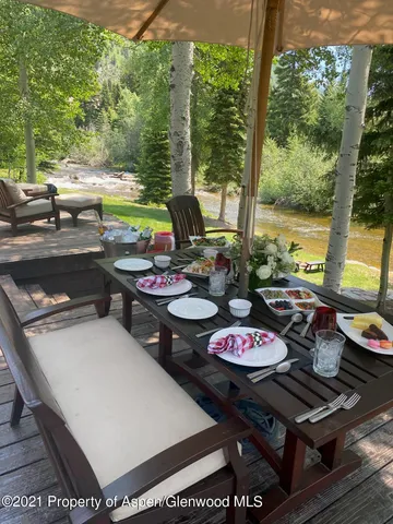 a view of a building with a yard