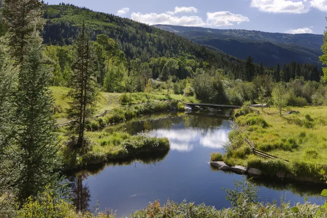 a view of a lake in front of house