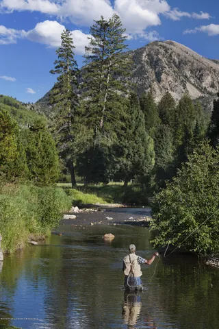 a view of house with ocean view