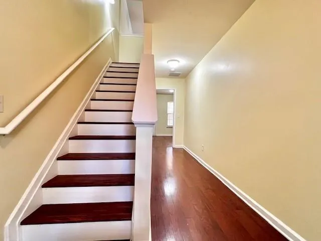 a view of entryway with wooden floor
