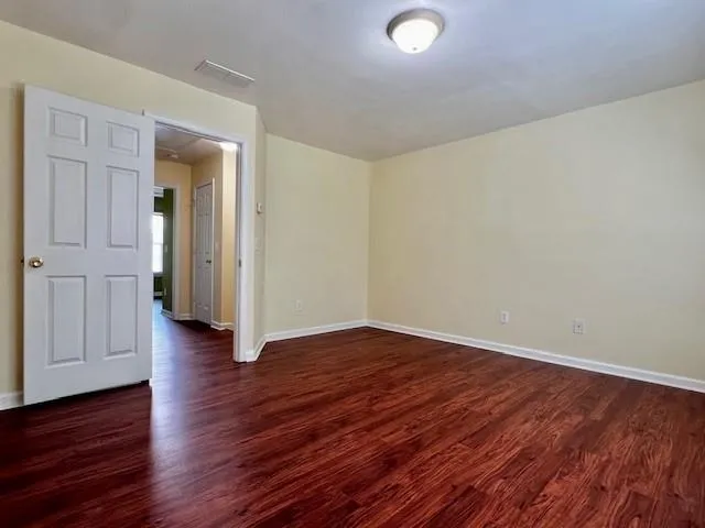 a view of a livingroom with wooden floor
