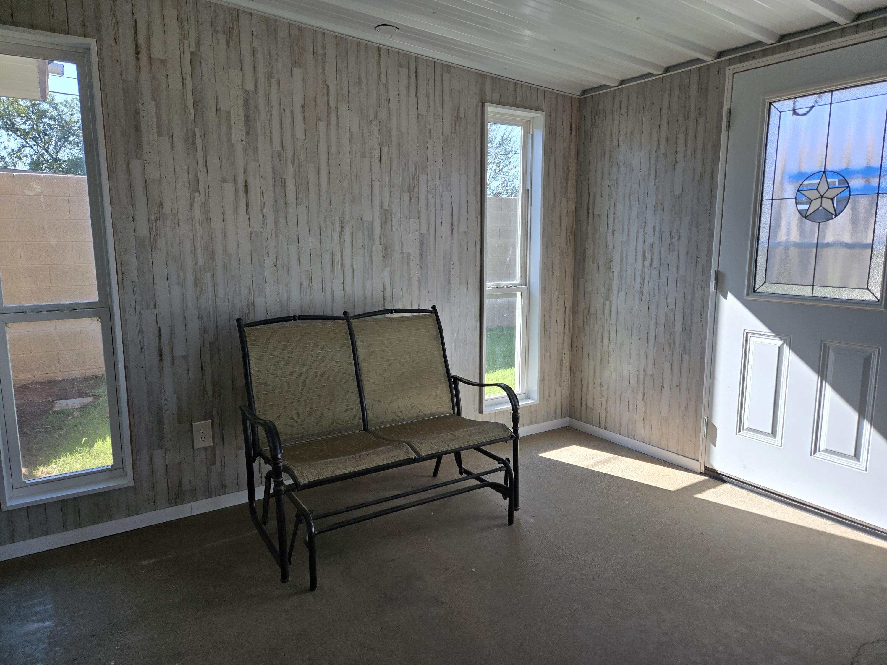 216 North 24th Street Lamesa, TX 79331 - Photo 18 of 27 a living room with furniture and a window