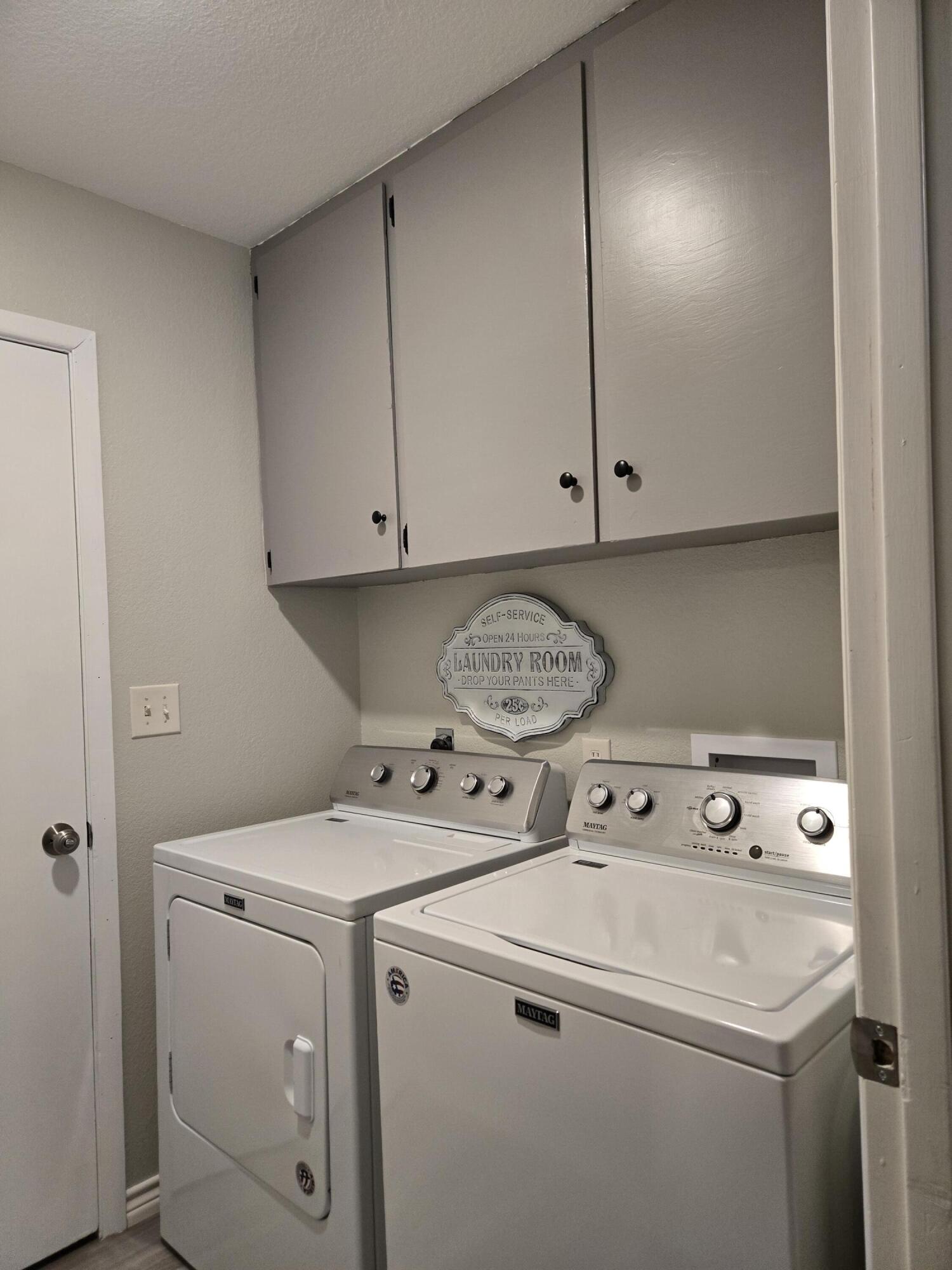 216 North 24th Street Lamesa, TX 79331 - Photo 19 of 27 a utility room with dryer and washer