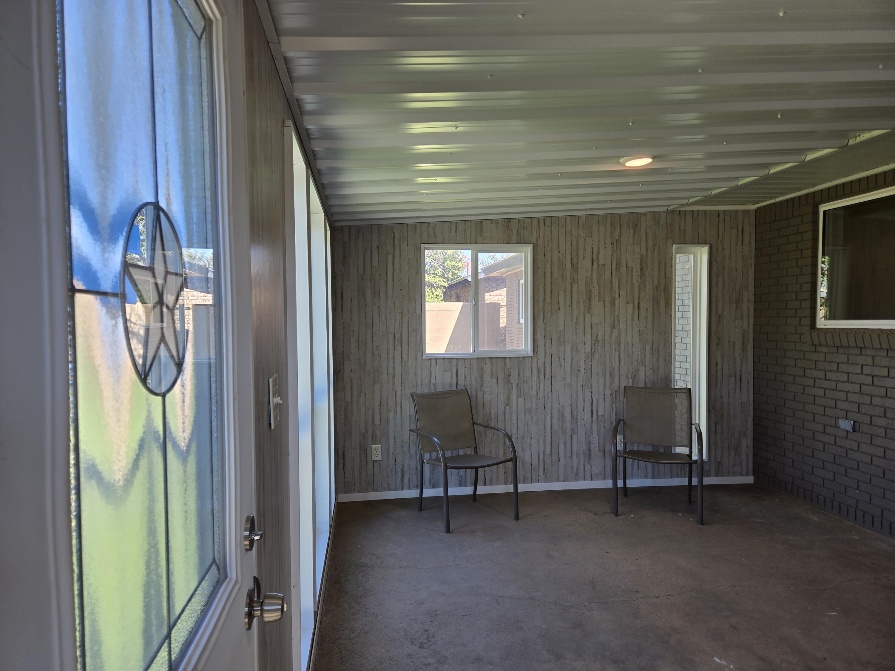 216 North 24th Street Lamesa, TX 79331 - Photo 21 of 27 a view of a hallway with wooden furniture