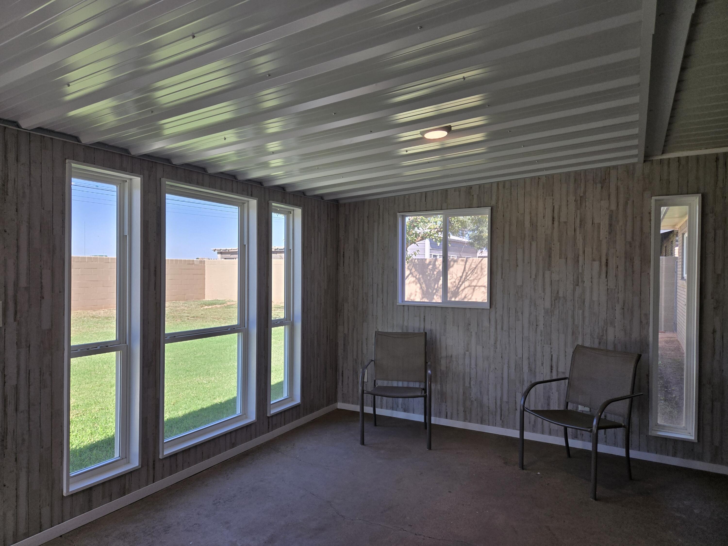 216 North 24th Street Lamesa, TX 79331 - Photo 22 of 27 a view of a livingroom with furniture and a window