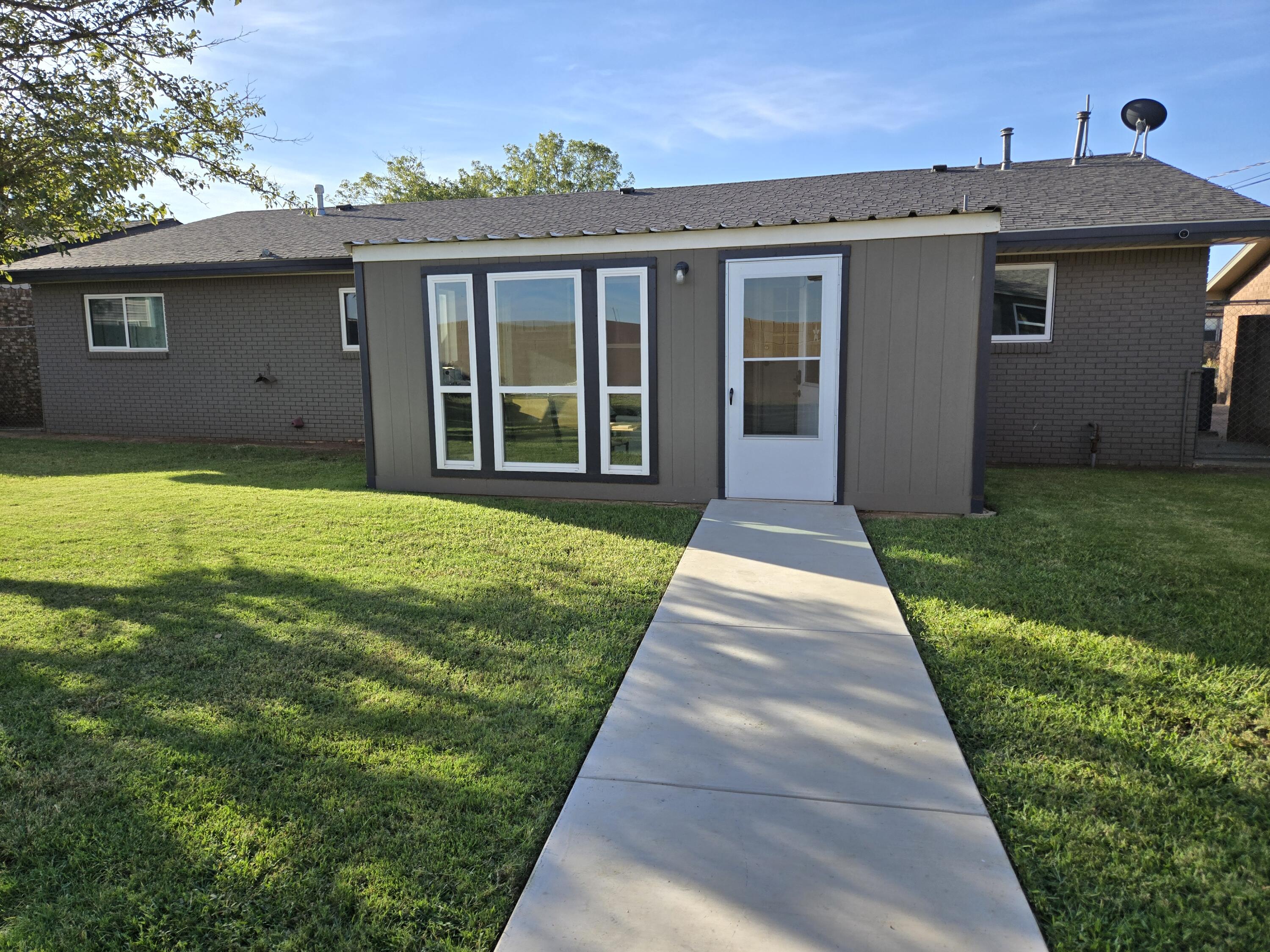 216 North 24th Street Lamesa, TX 79331 - Photo 26 of 27 a front view of house with yard