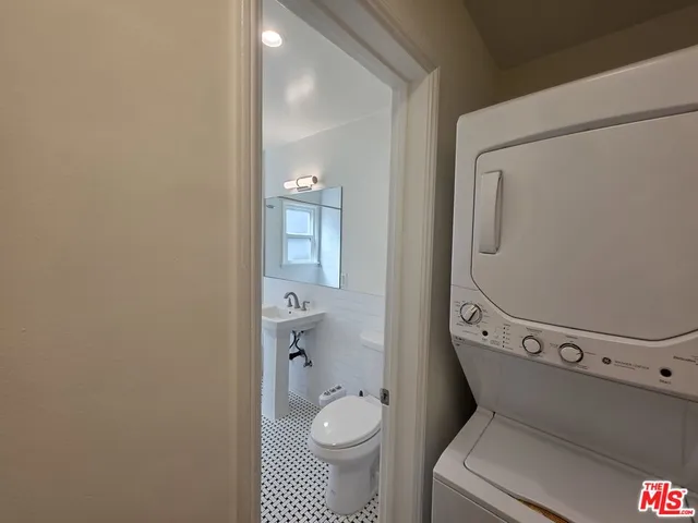 a bathroom with a toilet and a sink