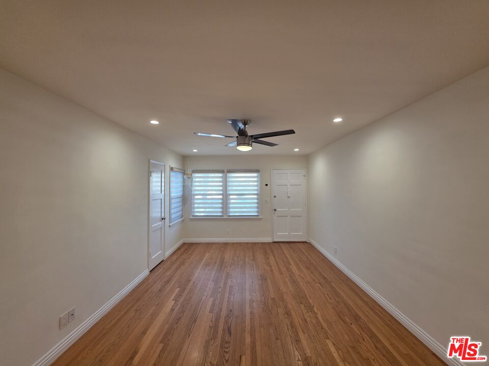 102 Gaviota Avenue, Unit 104 Long Beach, CA 90802 - Photo 31 of 42 wooden floor in an empty room with a window