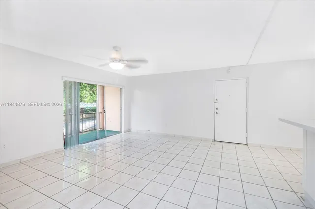a view of an empty room and window