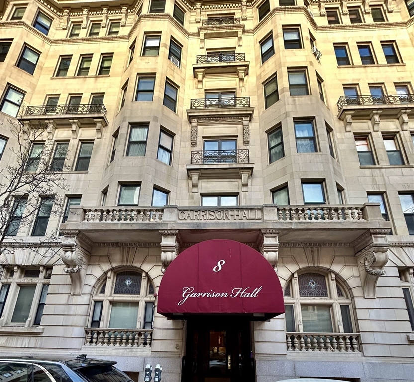 8 Garrison Street, Unit 608 Boston, MA 02116 - Photo 12 of 13 a front view of a building with retail shops