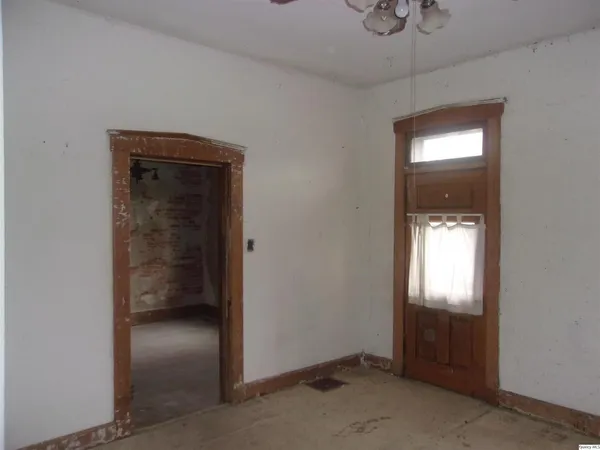 a view of a room with windows