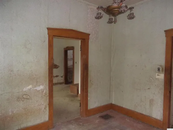 a view of a hallway with a glass door