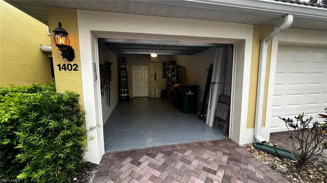 a hallway with a washer and dryer