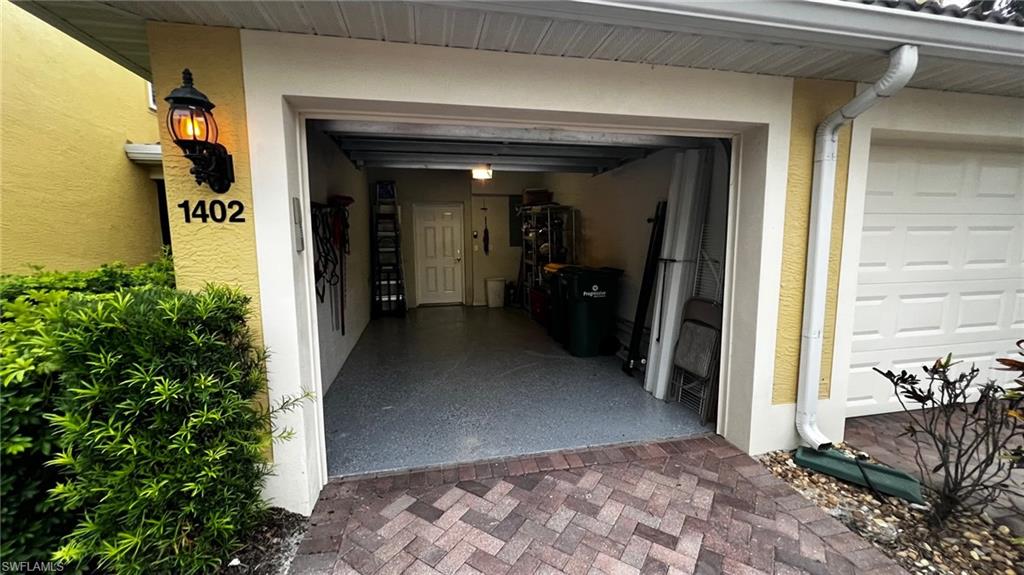 5705 Mayflower Way, Unit 1402 Ave Maria, FL 34142 - Photo 29 of 35 a view of a entryway door of the house