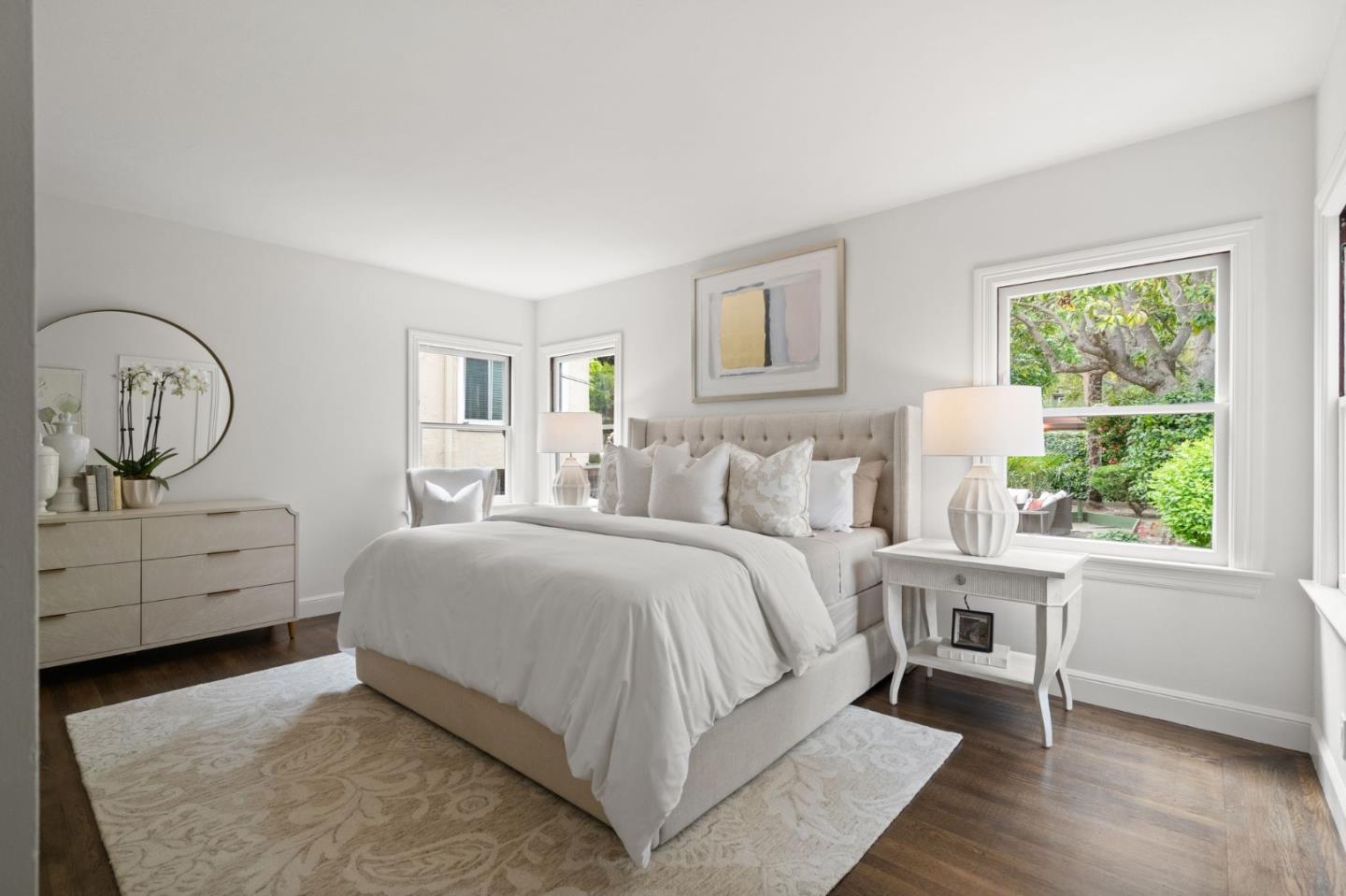 139 Warren Road San Mateo, CA 94401 - Photo 28 of 63 a bedroom with a bed a dresser and next to a window