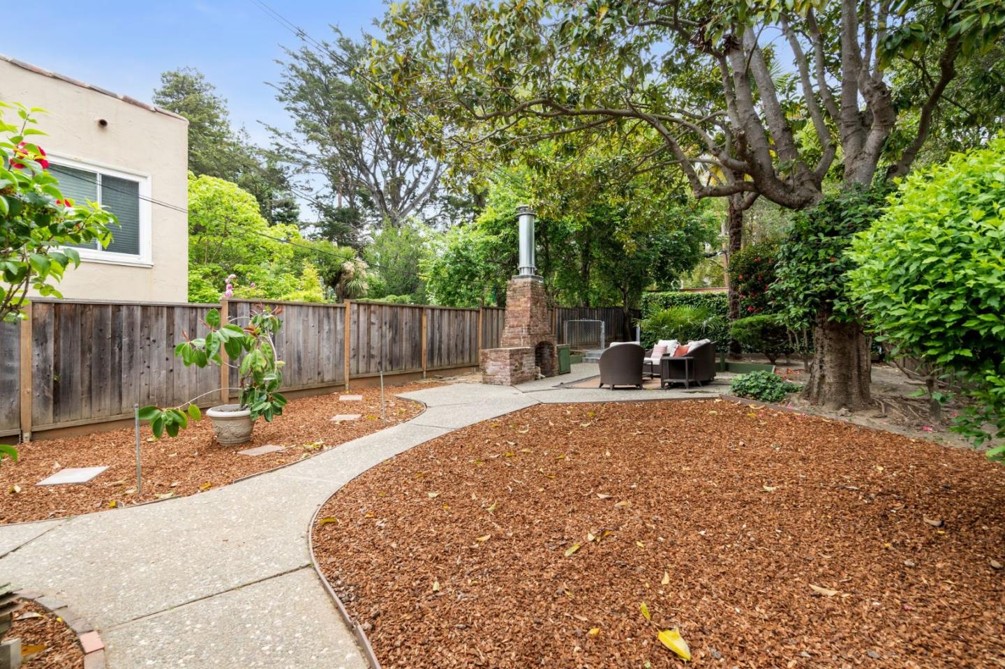 139 Warren Road San Mateo, CA 94401 - Photo 52 of 63 a view of a backyard with a patio