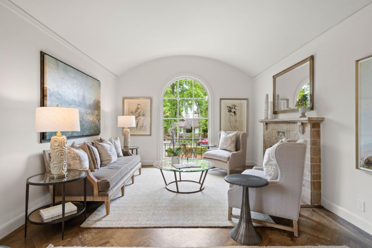 139 Warren Road San Mateo, CA 94401 - Photo 8 of 63 a living room with furniture a fireplace and a table