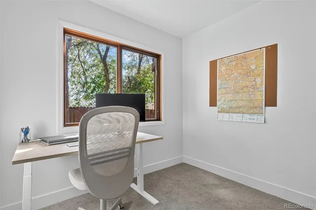 a room with furniture and a window