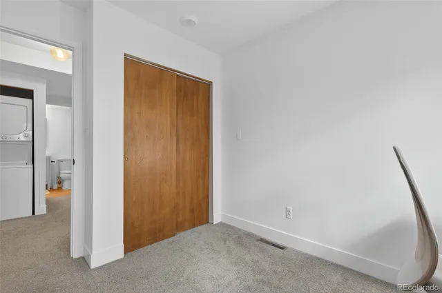 a view of a bathroom with a toilet