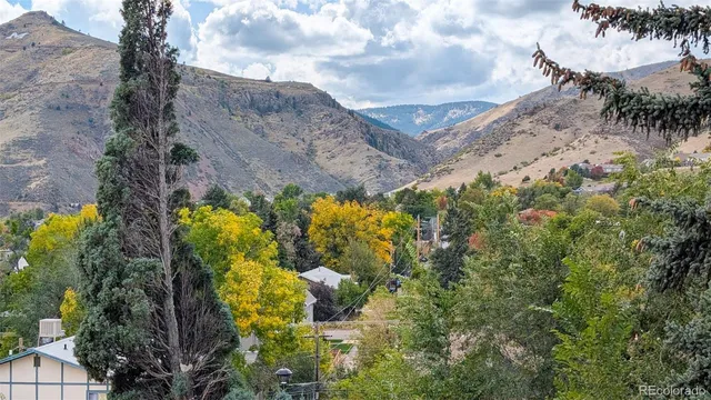 an aerial view of residential house and sandy dunes