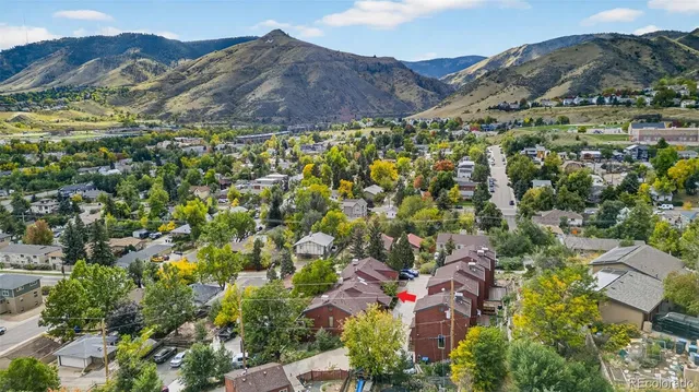 a view of mountains and valleys