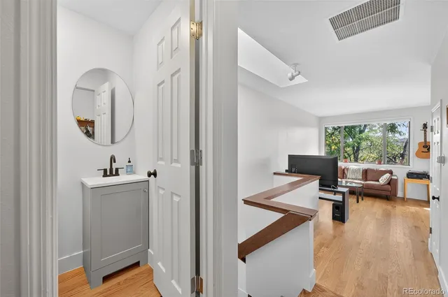a view of a living room and dining room