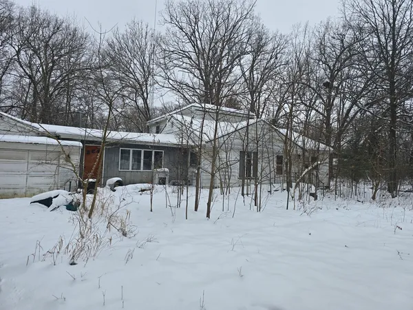 a view of a house with a patio