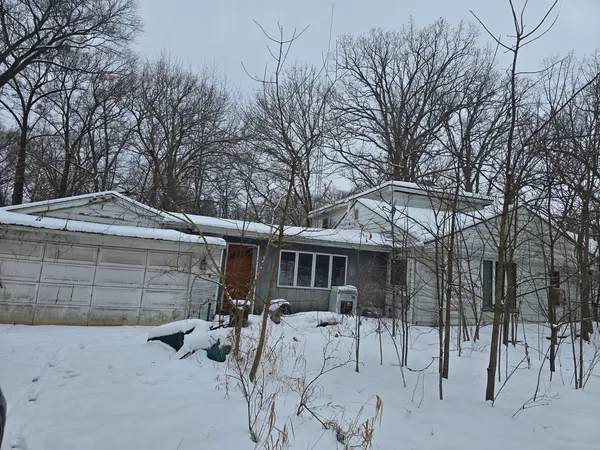 a view of a house with a patio