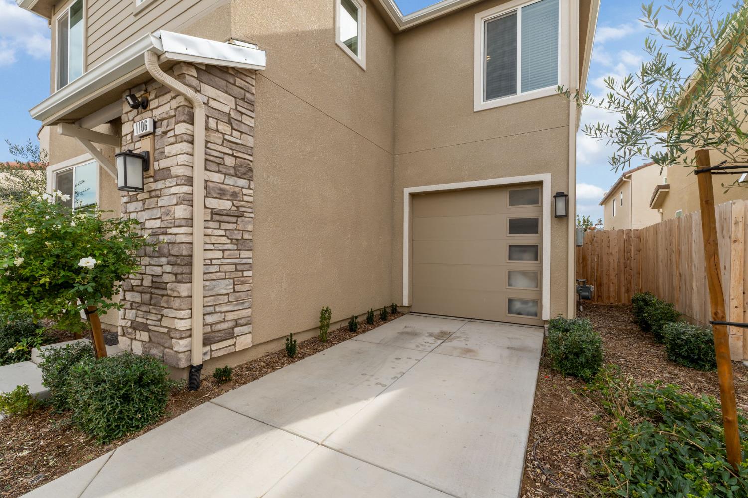 1106 Significant Way West Madera, CA 93636 - Photo 4 of 41 a view of a house with a yard