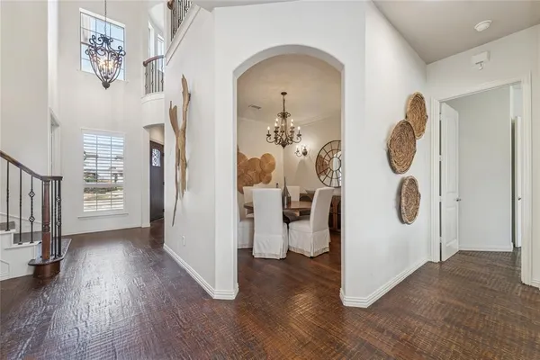 a view of entryway with wooden floor