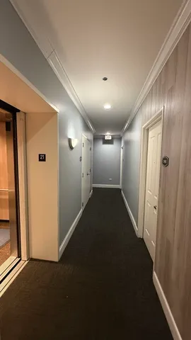 a living room with furniture pool table and a flat screen tv
