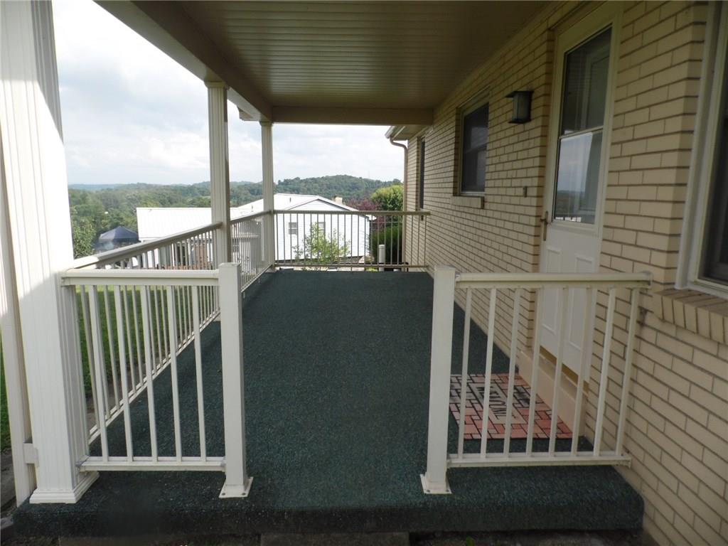 4 Truman Road Charleroi, PA 15022 - Photo 8 of 24 Enjoy your back yard on this fab covered porch right off the Kitchen.