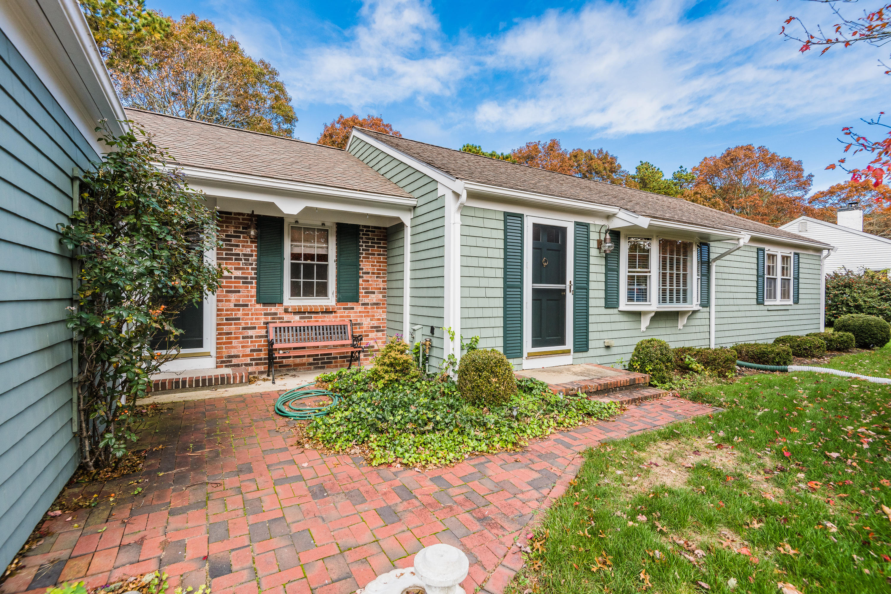 19 Shubael Gorham Road Centerville, MA 02632 - Photo 3 of 9 a front view of a house with garden