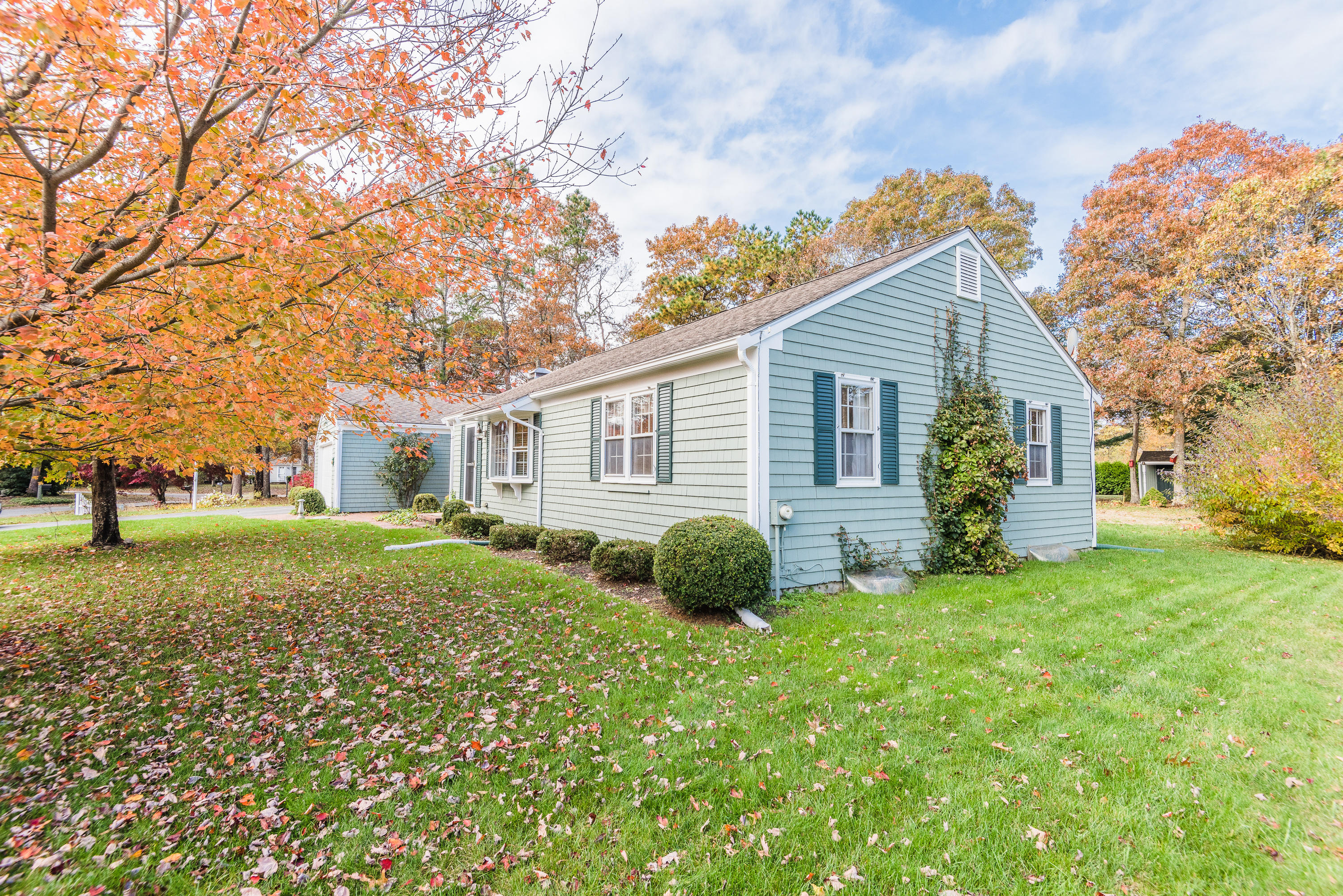 19 Shubael Gorham Road Centerville, MA 02632 - Photo 5 of 9 a view of a house with a yard