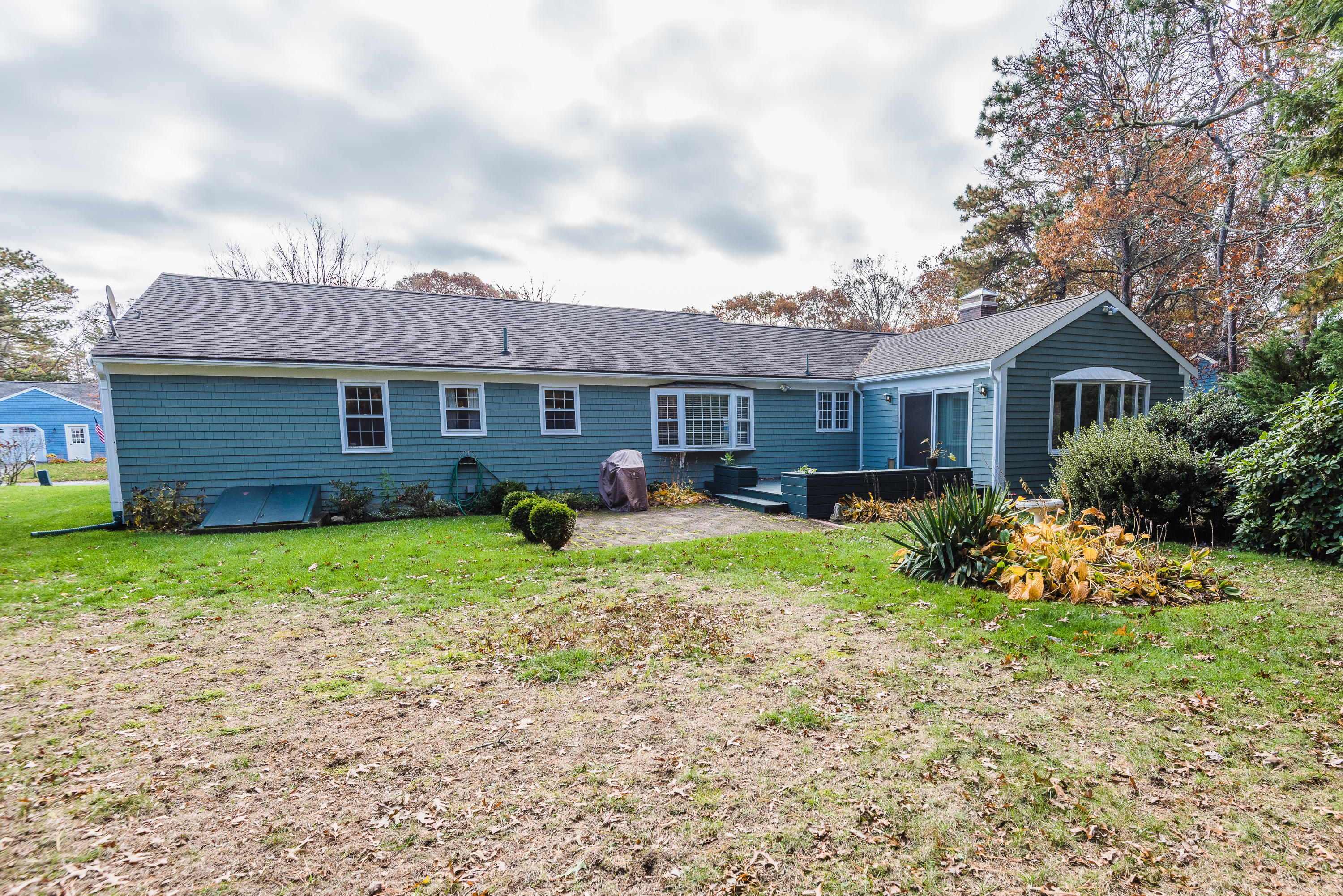 19 Shubael Gorham Road Centerville, MA 02632 - Photo 6 of 9 a view of a house with backyard and garden