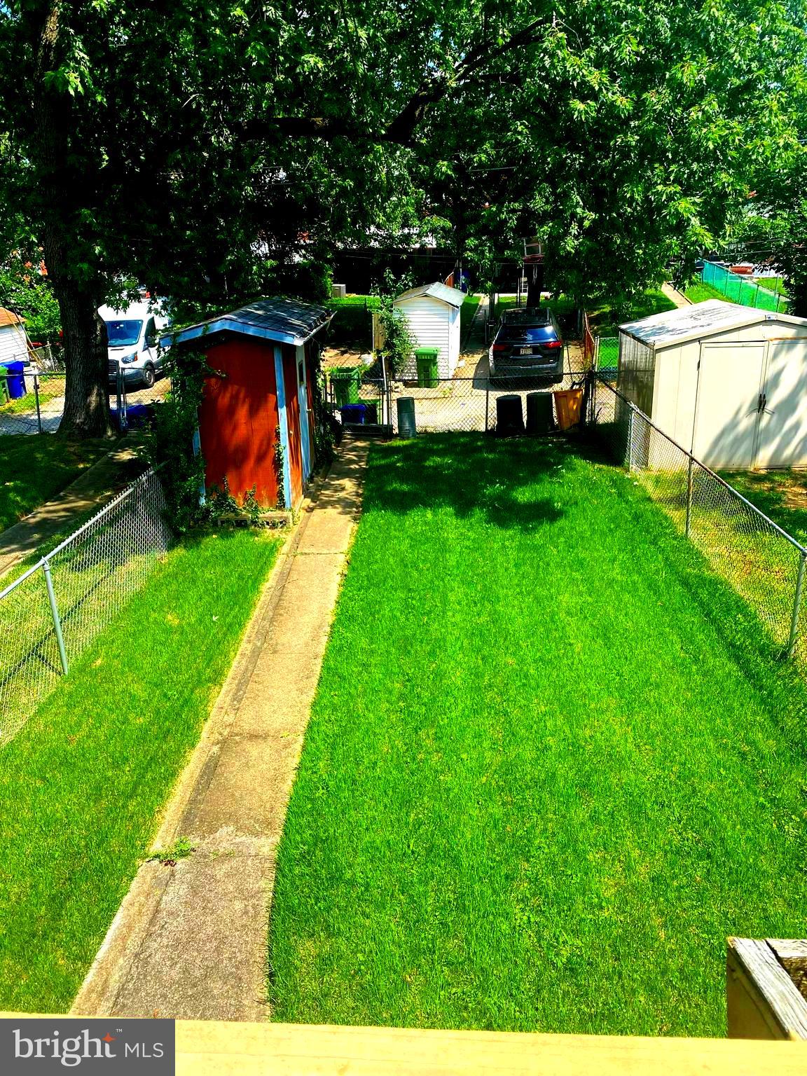 5905 Glenkirk Road Baltimore, MD 21239 - Photo 14 of 15 a view of a backyard with sitting area
