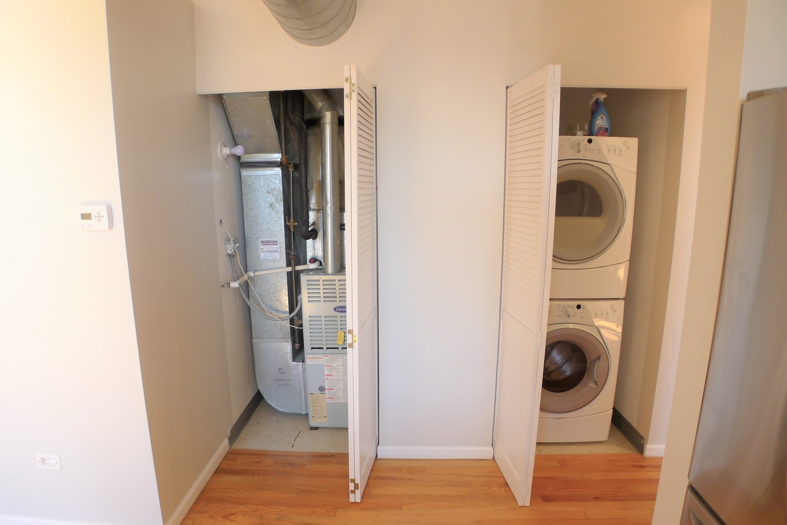 420 South Clinton Street, Unit 401A Chicago, IL 60607 - Photo 17 of 22 a view of a hallway with washer and dryer