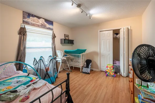 a view of outdoor space with signage and flags