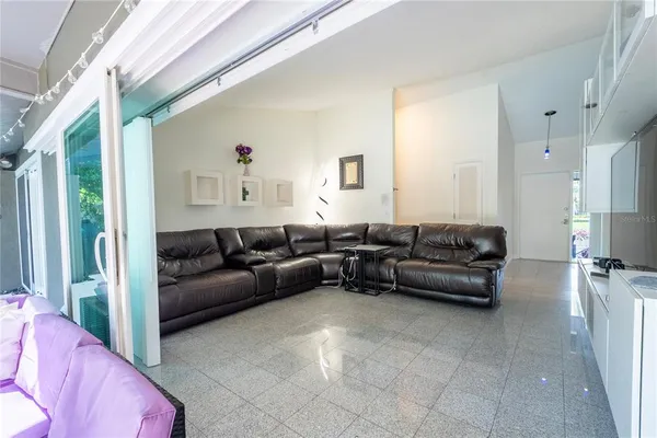 a view of a park with large trees