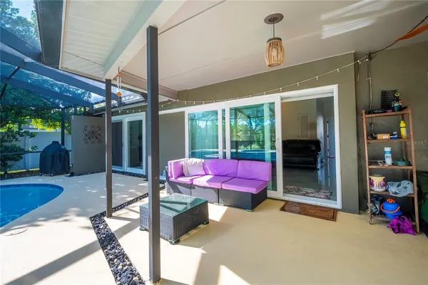 a view of a park with large trees