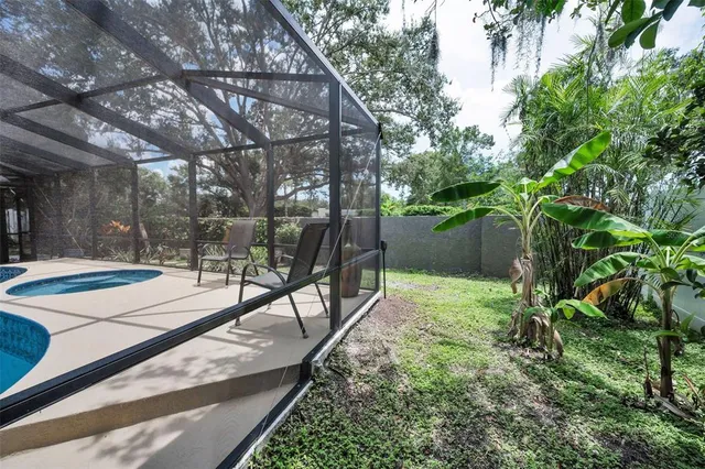 an aerial view of a house with swimming pool